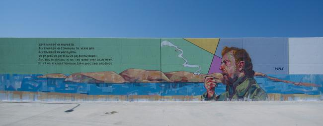 Γκράφιτι με τη μορφή του Γ. Ρίτσου στον Αη Στράτη: «Δεν έχω καιρό να κουραστώ. Δεν έχω καιρό να σταυρώσω τα χέρια μου…»